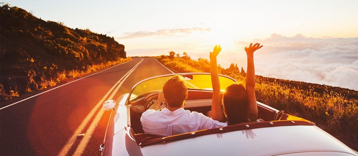 couple in car sunset